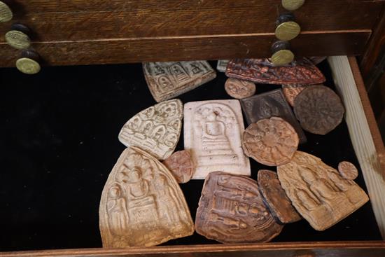 Three cabinets containing Indian stupa